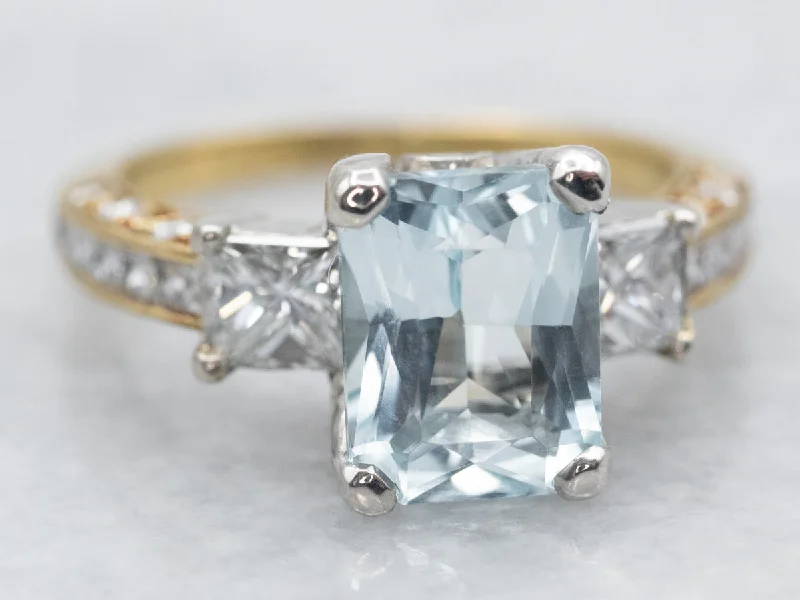 Regency style rings-Mixed Metal Yellow Gold and Platinum Blue Topaz Ring with Diamond Accents