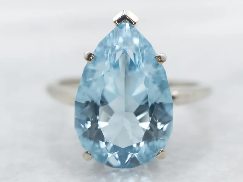 Curved art rings-White Gold Pear Cut Blue Topaz Solitaire Ring